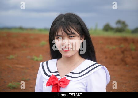 Photo de girl sitting smiling Banque D'Images