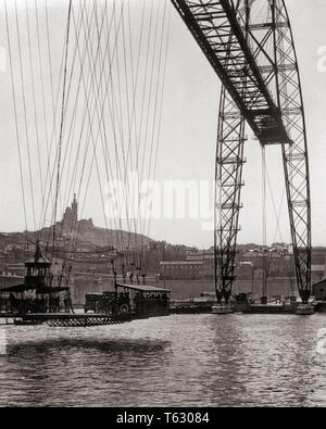 1920 LOCATION DE TRANSPORTER BRIDGE OU PONT TRANSBORDEUR OU TRANSFERT AÉRIEN pont conçu par l'INGÉNIEUR FERDINAND ARNODIN MARSEILLE FRANCE - r2424 HAR001 HARS Old Fashioned Banque D'Images