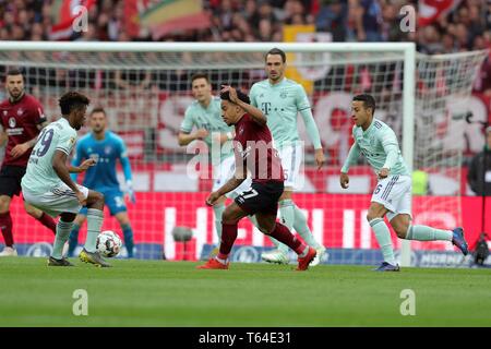 Nuremberg, Allemagne. Apr 28, 2019. 1. FC Nuremberg - FC Bayern Munich 1 : 1, Kingsley Coman, Bayern Munich, Bayern, FCB, Munich, Munich, Matheus Pereira, 1. FC Nuremberg, Nurnberg, FCN, plein la figure, les duels, l'utilisation de crédit dans le monde entier | : dpa/Alamy Live News Banque D'Images