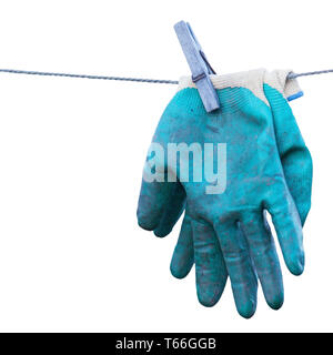 Gants de jardinage vieux isolé sur fond blanc. Banque D'Images