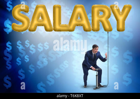 L'homme d'affaires en salaire de pompage concept Banque D'Images