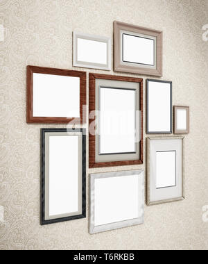 Photo frames disposées sur le mur. Dimensions 3D. Banque D'Images