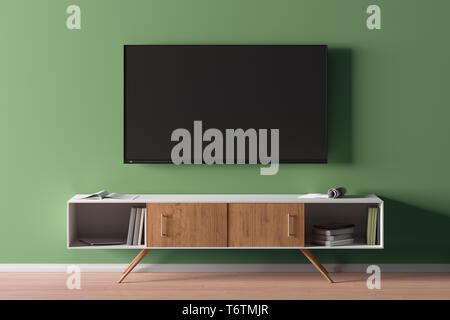 Écran de télévision sur le mur vert au-dessus du meuble de télévision dans le fond de salon moderne Banque D'Images