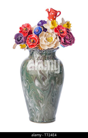 Bouquet de fleurs décoratives en céramique dans un vase Banque D'Images