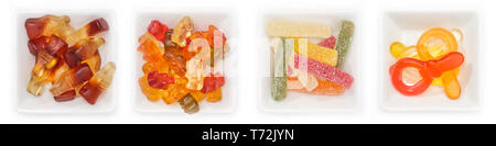 Collection de différents bonbons aux fruits de la gomme dans des bols en vue supérieure
