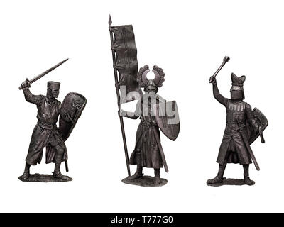 Des soldats de plomb chevaliers médiévaux. Lot de 3 chevaliers. Knight avec bannière. Banque D'Images