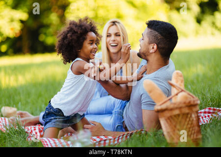 Happy Family having fun time on picnic Banque D'Images