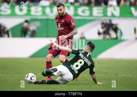 Wolfsburg, Allemagne. 04 mai, 2019. Mikael ISHAK (gauche, N) et Renato STEFFEN (WOB), action, les duels, football, Bundesliga 1ère journée.32, VfL Wolfsburg (WOB) - 1.FC Nuremberg 2 : 0, 4/4/2019 à Wolfsburg/Allemagne, ¬ | Conditions de crédit dans le monde entier : dpa/Alamy Live News Banque D'Images