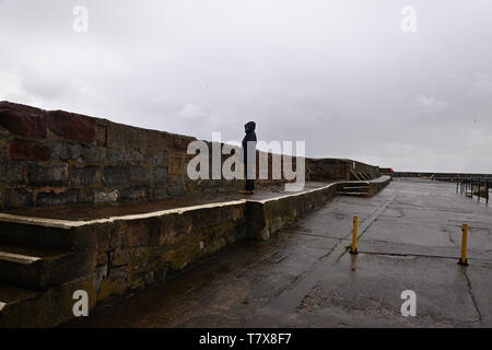 Une journée très humide à Watchet Harbour à pied. Banque D'Images