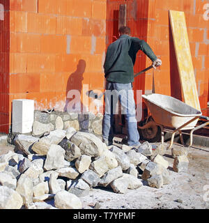 Construction d'une maison d'habitation en brique Banque D'Images