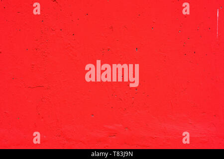 Résumé rouge mur de ciment comme arrière-plan, textures urbaines Banque D'Images