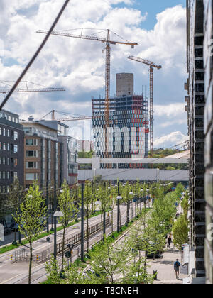 Stockholm, Suède - 12 mai 2019 : l'Sthlm 01 est un nouveau scyscraper en partie sud de Stockholm Hammarby Sjostad est beeing construit. Grues et construc Banque D'Images