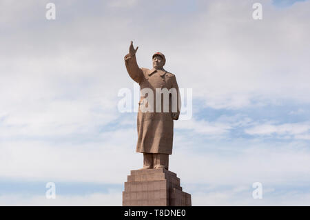 Une statue de Mao Zedong dans la ville de Kashgar, Xinjiang, Chine Banque D'Images