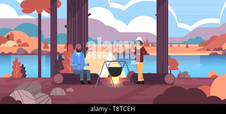 Les randonneurs african american couple homme femme préparer les repas en bowler pot d'eau bouillante au camp de camp tente camping rivière paysage nature automne concept Illustration de Vecteur