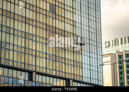 Hong Kong, Chine - la façade de l'immeuble les travaux de réparation Banque D'Images