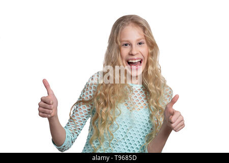 Portrait of cute teen blonde girl showing Thumbs up Banque D'Images
