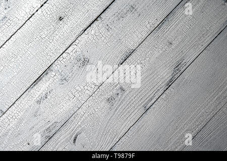 Planches en bois naturel très détaillées peint en blanc couleur avec effet de craquelures. Texture blanc et gris de fond avec la mise en page et en diagonale Banque D'Images