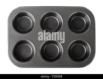 Pour la cuisson, un plat de cuisson muffins cupcake isolé sur fond blanc Banque D'Images
