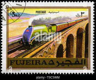 Timbre-poste de Fujairah dans les chemins de fer série émise en1971 Banque D'Images