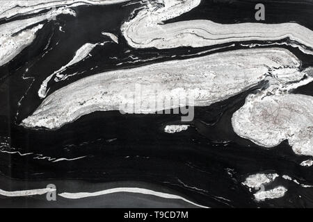 La texture de granit noir et blanc. Arrière-plan de la pierre naturelle. Banque D'Images