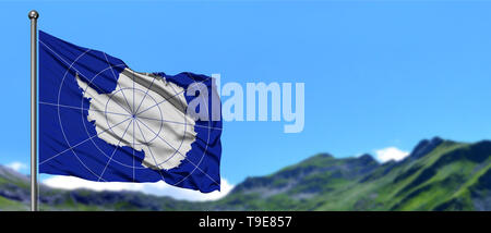 De brandir le drapeau de l'Antarctique dans le ciel bleu avec des champs verts au sommet de montagne l'arrière-plan. Thème de la nature. Banque D'Images