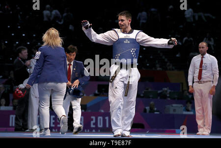 Moldova's Aaron Cook est déprimé après avoir perdu son match de quart de finale contre l'Azerbaïdjan's Milad Beigi Harc, pendant quatre jours de la World Taekwondo Championships à la Manchester Arena, Manchester. Banque D'Images