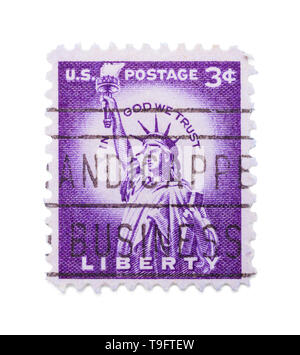 Vieille Statue de la liberté Stamp isolé sur blanc. Banque D'Images