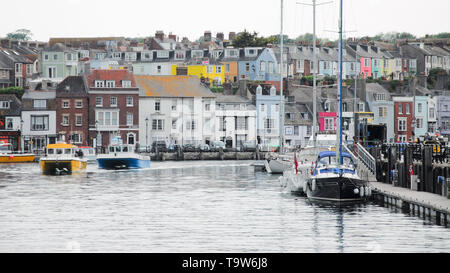 Weymouth. 20 mai 2019. Des bateaux qui partent du port de Weymouth un ciel couvert, juste après 8h00, prendre les gens de la tige de la pêche en mer. crédit : Stuart fretwell/Alamy Live News Banque D'Images