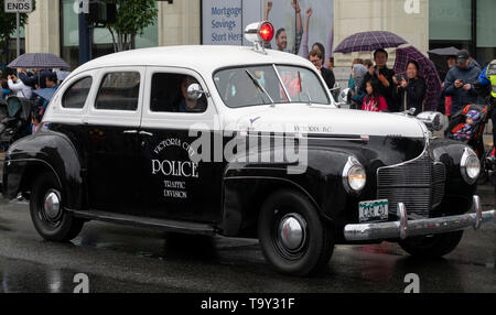 Une voiture de police vintage dans le Victoria Day Parade le 20 mai 2019 à Victoria, Colombie-Britannique, Canada. Banque D'Images