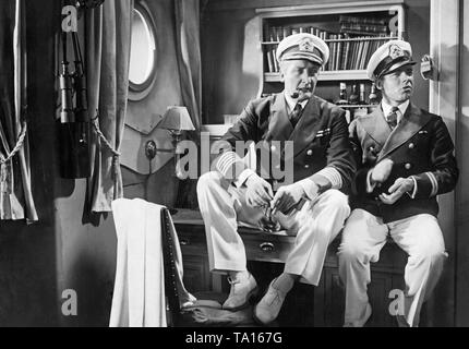 Hans Albers comme capitaine Craddock (à gauche) et Heinz Ruehmann comme premier officier Peter dans le film 'opérette bombes sur Monte Carlo' sous la direction de Hanns Schwarz, avec musique de Werner Richard Heymann. Banque D'Images