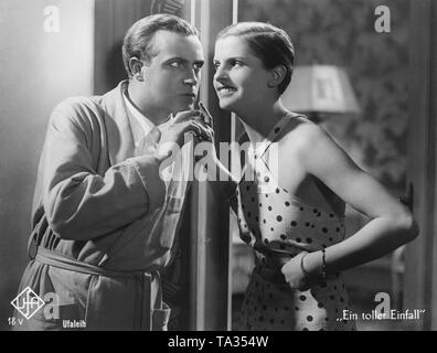 Willy Fritsch (l.) dans le film "une idée folle". L'actrice à ses côtés porte une coupe appelée chasseur. Banque D'Images