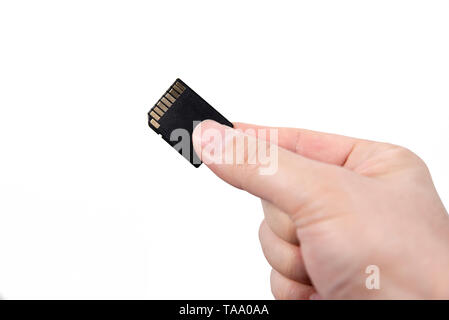 La main avec carte SD isolé sur fond blanc Banque D'Images
