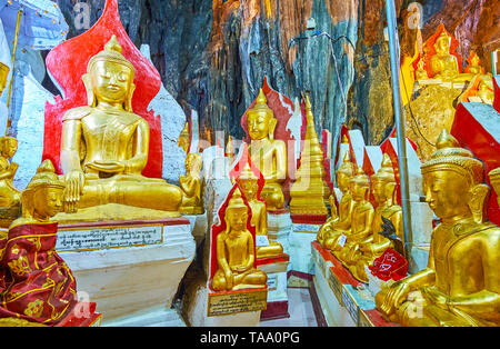 PINDAYA, MYANMAR - février 19, 2018 : plusieurs statues de Bouddha dans la halle de Pindaya cave sont donnés par différentes personnes de nombreux pays et religiou Banque D'Images