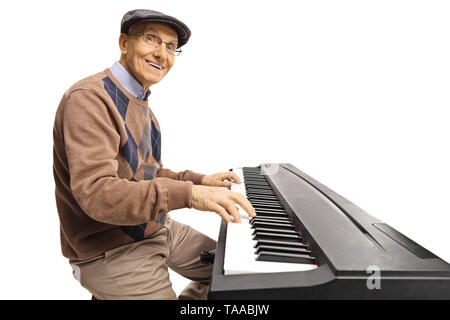 Cheerful senior man playing piano clavier numérique isolé sur fond blanc Banque D'Images