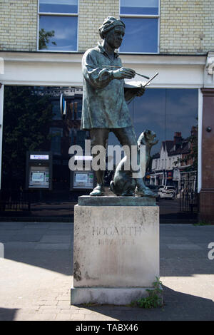 La statue du peintre William Hogarth et son chien pug Trump par le sculpteur Jim Mathieson , Chiswick High Road, London, W4 UK Banque D'Images