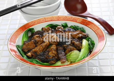 Les huîtres séchées braisées avec mousse noire (ho voir fat choy ) , Nouvel an chinois traditionnels lave Banque D'Images