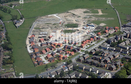 Vue aérienne de nouvelles maisons en construction sur un terrain vert site dans le Nord de l'Angleterre Banque D'Images