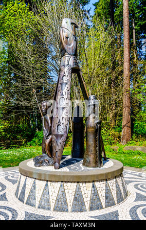 Les Portugais Joe statue est une sculpture en bronze dans le parc Stanley. Un hommage à la connexion entre le domaine ancestral des autochtones et du portugais Banque D'Images