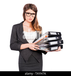 Businesswoman en tailleur holding folders Banque D'Images