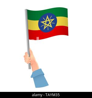 Ethiopie drapeau dans la main. Contexte patriotique. Drapeau national de l'Éthiopie illustration Banque D'Images