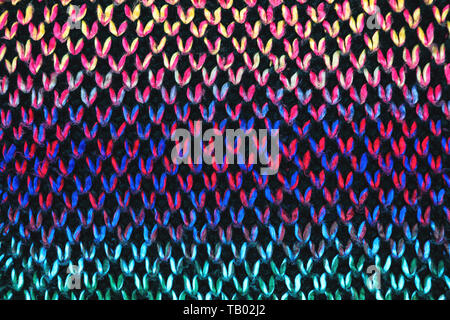 Tissu maille lâche avec la texture de laine. Tricot Machine à répétition de Texture chandail chaud. Tricoté de couleur vive. Banque D'Images
