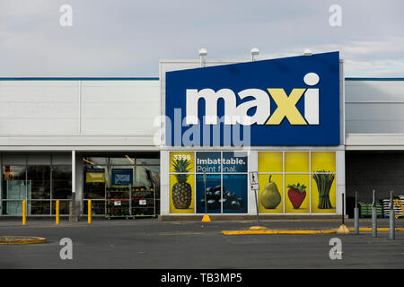 Un logo affiche à l'extérieur d'un Maxi épicerie de détail location à Greenfield Park, Québec, Canada, le 23 avril 2019. Banque D'Images