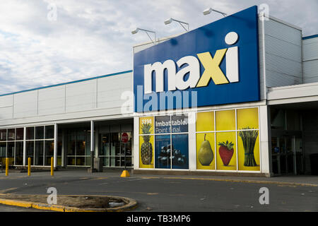 Un logo affiche à l'extérieur d'un Maxi épicerie de détail location à Greenfield Park, Québec, Canada, le 23 avril 2019. Banque D'Images