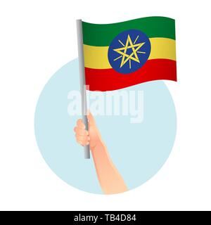 Ethiopie drapeau dans la main. Contexte patriotique. Drapeau national de l'Éthiopie illustration Banque D'Images