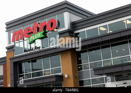 Un logo d'une enseigne à l'extérieur de l'épicerie au détail Metro Plus Emplacement du magasin à Vaudreuil-Dorion, Québec, Canada, le 21 avril 2019. Banque D'Images