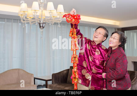 La famille accueille le Nouvel An chinois. Banque D'Images