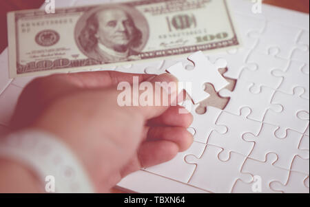 Dernière pièce du puzzle mis en place pour l'idée d'une solution financière Banque D'Images