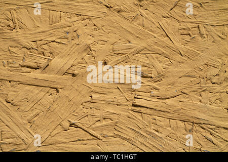 La texture de la surface en bois peint jaune Banque D'Images