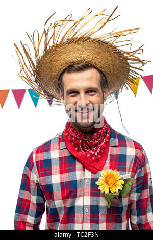 Heureux l'homme à chapeau de paille avec le tournesol dans pocket Isolated On White Banque D'Images