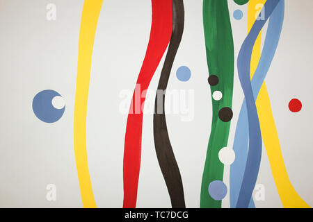 Une image de lignes verticales ondulées de couleur sur un fond gris. Banque D'Images